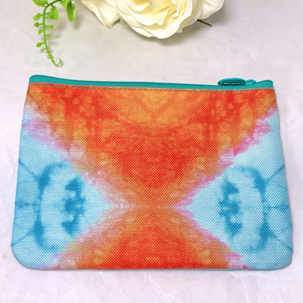 New IPSY bag Tie Dye Shades of Orange, Blues